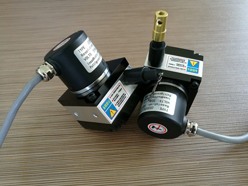 ���������K���a��